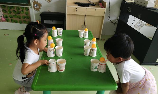 乒乓球投纸杯的技巧与窍门（掌握技巧，轻松实现乒乓球投纸杯的高难度动作）